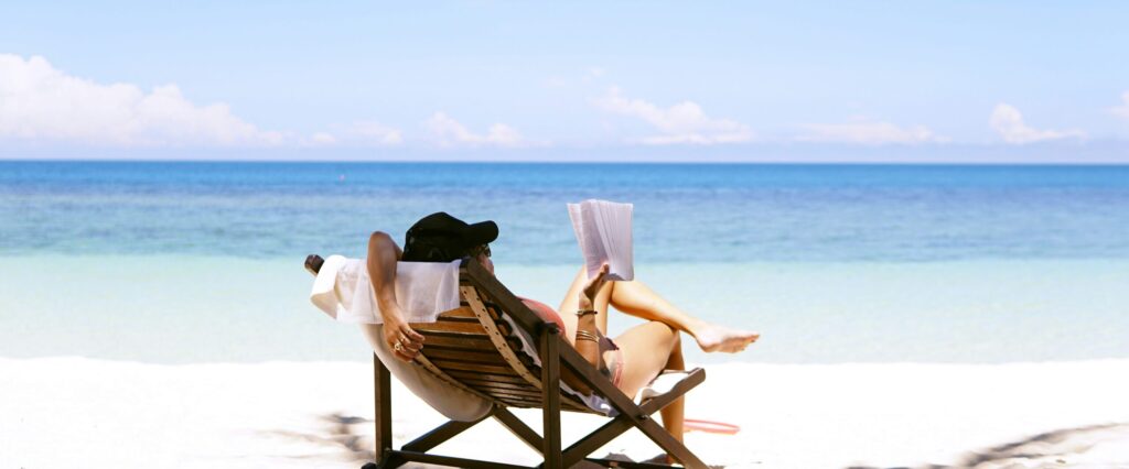 woman reading beach-