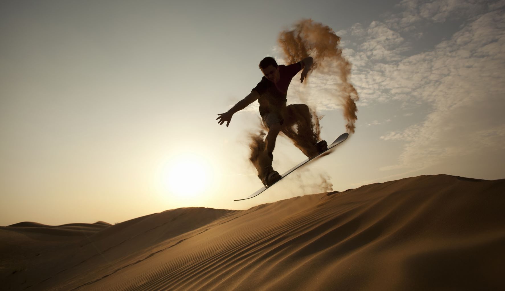 sandboarding in the desert