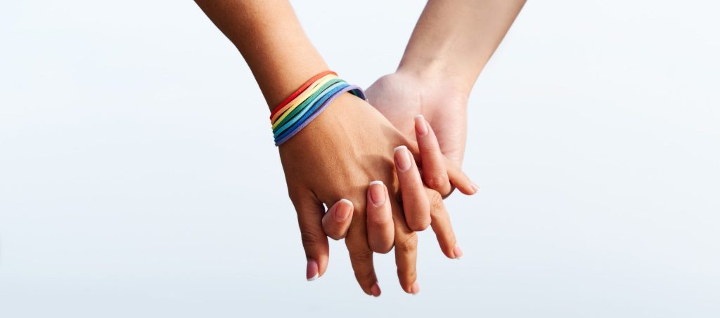lgbt cruises couple holding hands